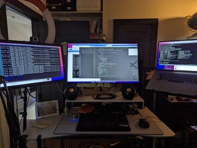 Photo of my two monitors and my laptop.